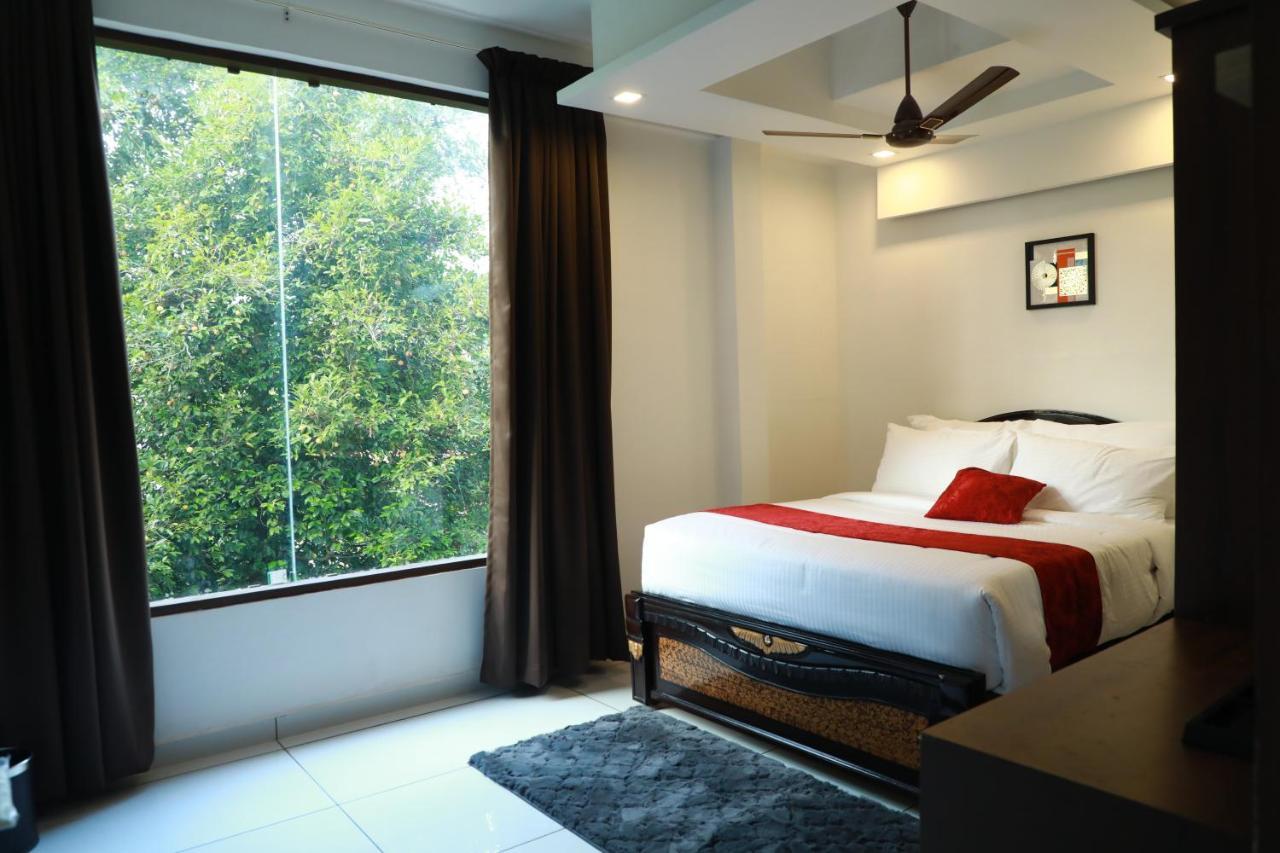 Achoos Residency Tiruvalla Exterior foto