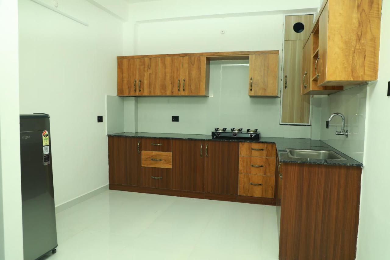 Achoos Residency Tiruvalla Exterior foto