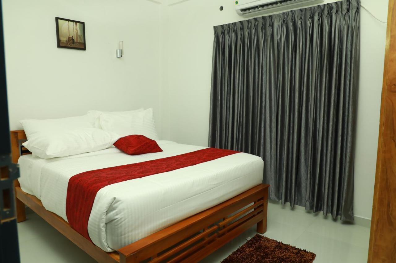 Achoos Residency Tiruvalla Exterior foto