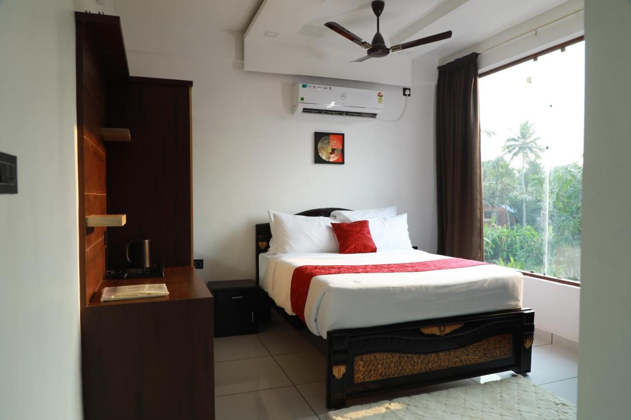 Achoos Residency Tiruvalla Exterior foto